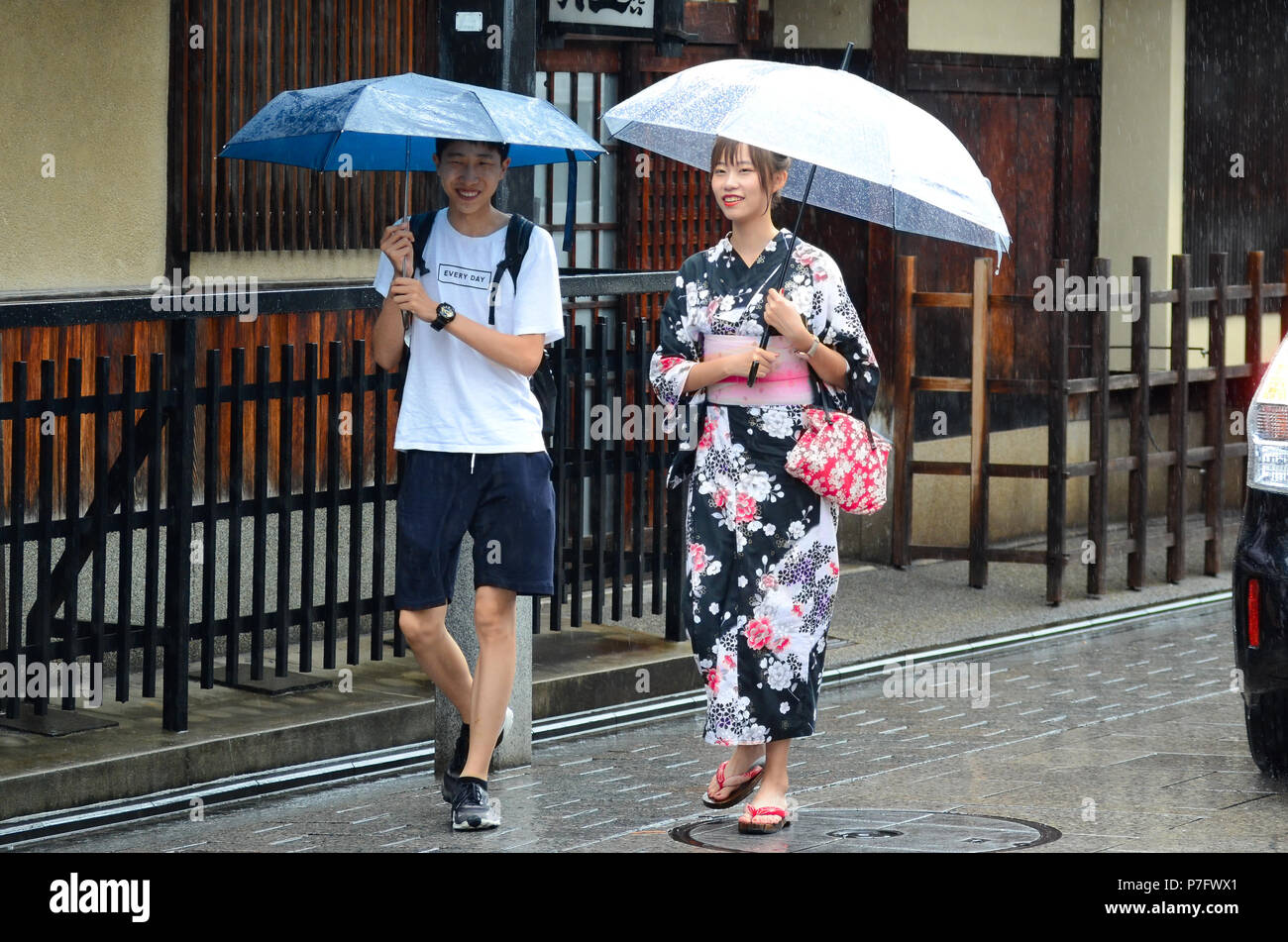 Kyoto, Japan. 6th July, 2018. Despite the rain, tourists continue to enjoy Kyoto's ancient Gion district. Credit: Trevor Mogg / Alamy Live News Stock Photo