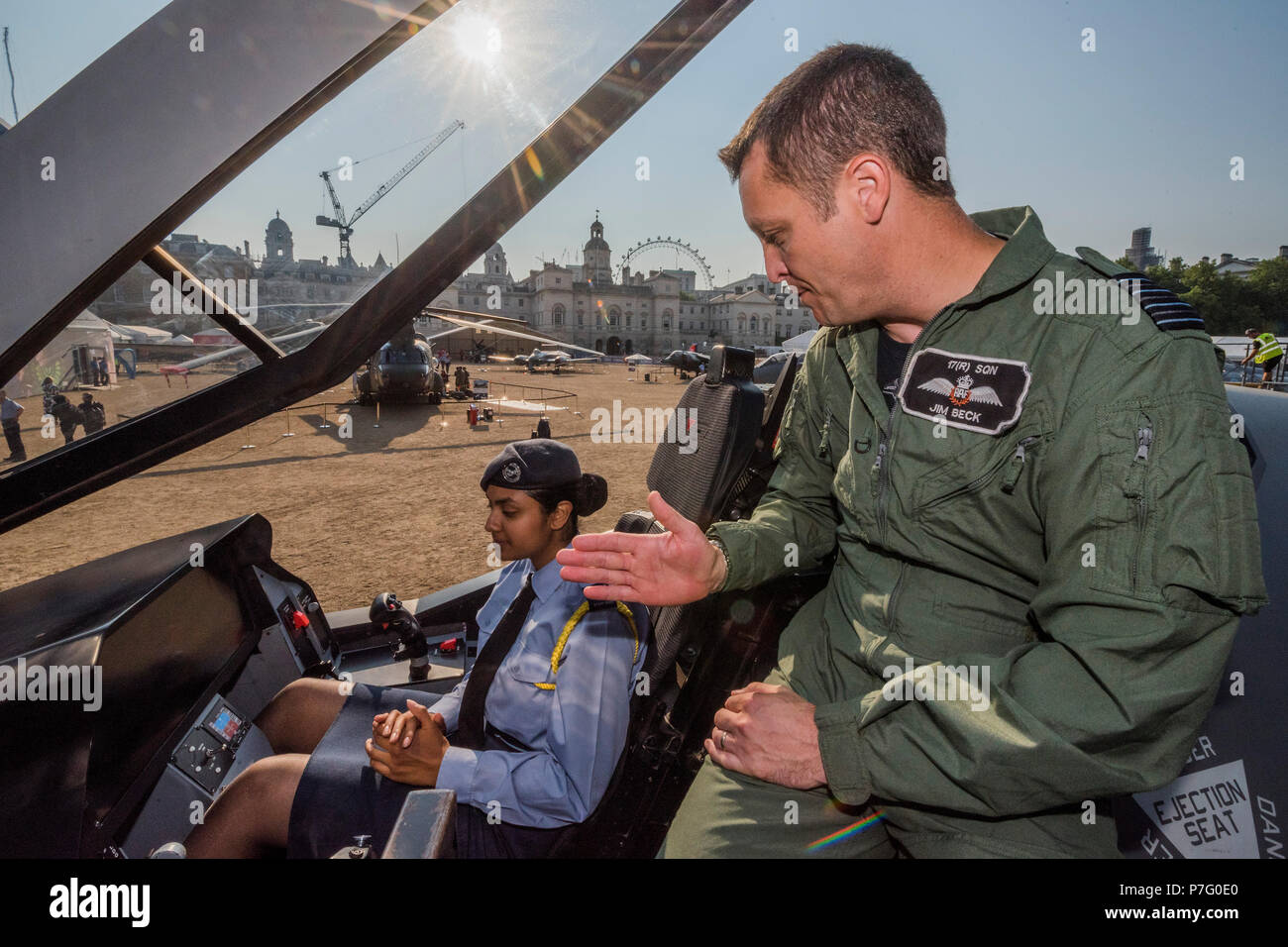 London, UK. 6th July 2018. Cadet CWO Shiva Bersavel and Grp Cpt Jim Beck on the F35-B Lightning IIBritain’s new, state-of-the-art stealth combat aircraft - RAF 100, Horse Guards Parade. As part of the 100th Anniversary celebrations of the Royal Air Force, an exhibition of aircraft covering the RAF’s history, from WW1 and WW2 through to the modern age. Credit: Guy Bell/Alamy Live News Stock Photo