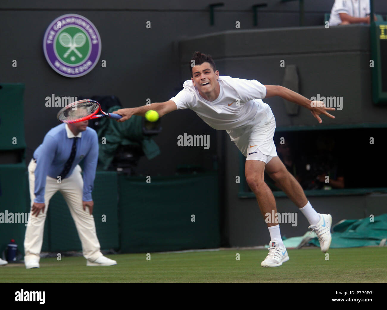London, UK. 05th July, 2018. London, England - July 5, 2018. Wimbledon Tennis: American Taylor Frtiz in action against Number 4 seed Alexander Zverev, of Germany during their second round match at Wimbledon. Credit: Adam Stoltman/Alamy Live News Stock Photo
