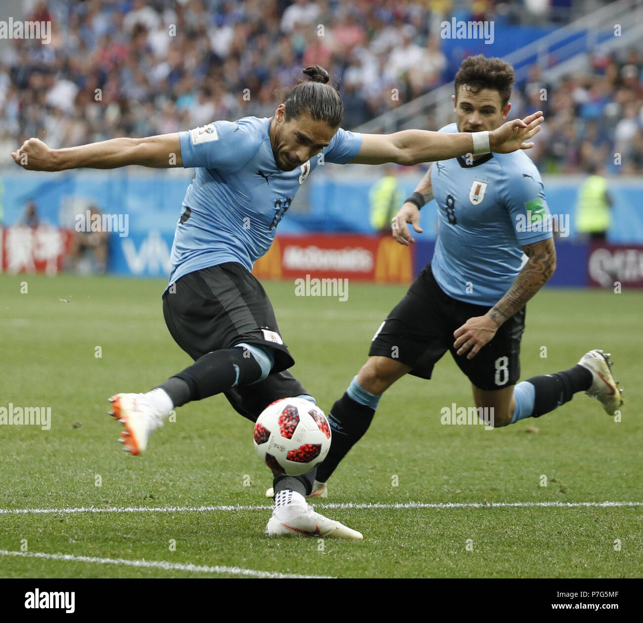 Nizhny Novgorod, Russia. 6th July, 2018. Martin Caceres (L) of Uruguay competes during the 2018 FIFA World Cup quarter-final match between Uruguay and France in Nizhny Novgorod, Russia, July 6, 2018. France won 2-0 and advanced to the semi-finals. Credit: Ye Pingfan/Xinhua/Alamy Live News Stock Photo