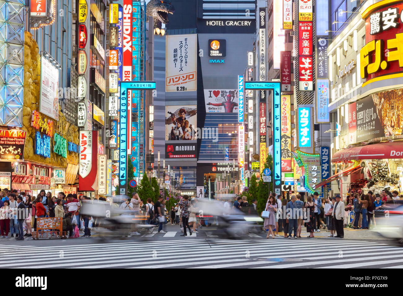 Night shot of busy street in the area of Shinjuku, central Tokyo, Japan. Stock Photo