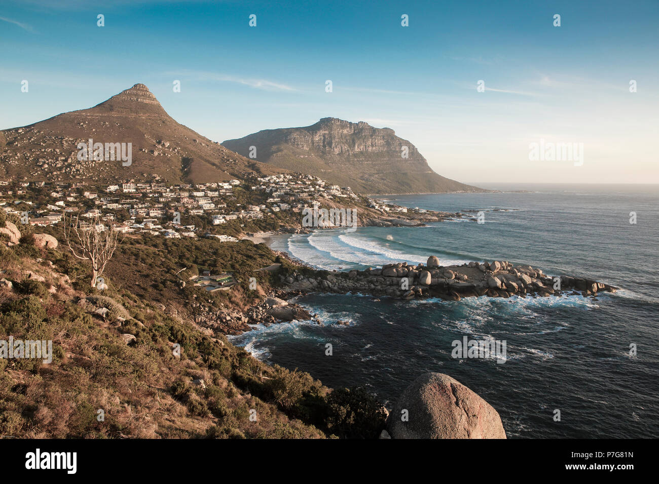 Scenic view of surfing waves breaking at Llandudno on the Cape peninsula, Cape Town, South Africa Stock Photo