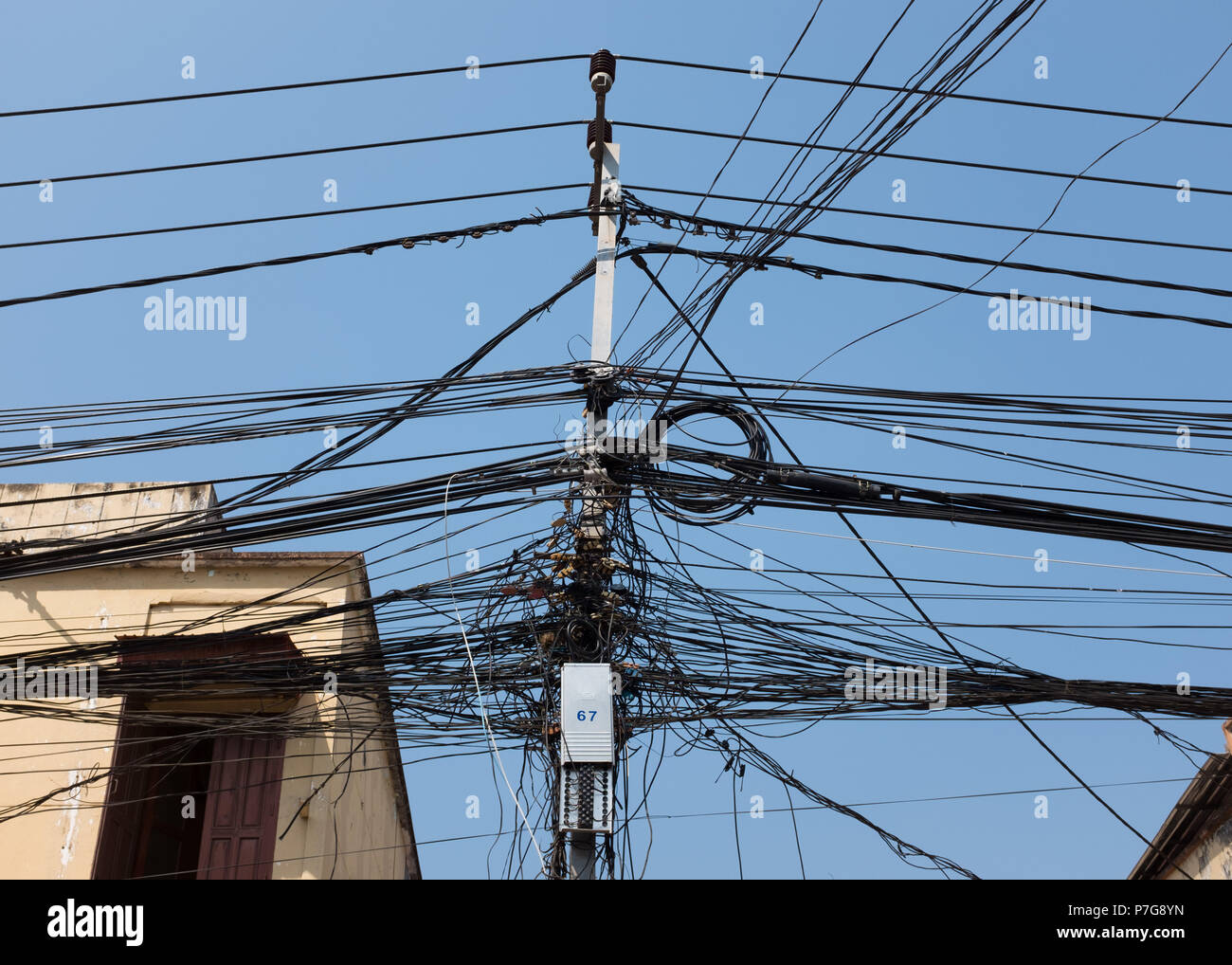 Low angle view of overhead electricity cables, Vientiane, Laos, Asia. Stock Photo
