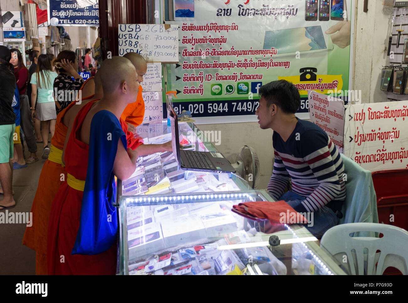 Mobile phones in laos hires stock photography and images Alamy