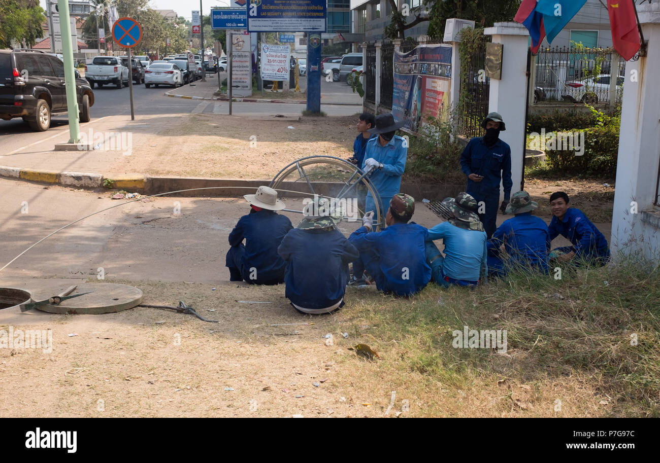 "Workers taking a break, Vientiane, Laos, Asia.  " Stock Photo