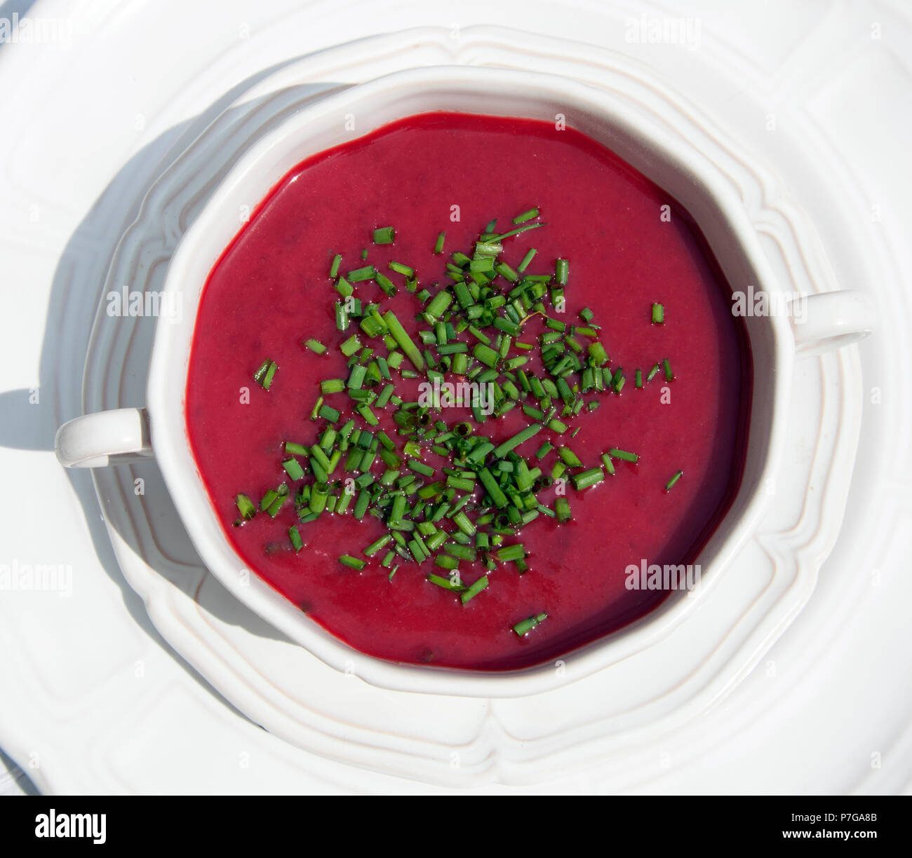 Homemade Borscht with freshly cut chives Stock Photo