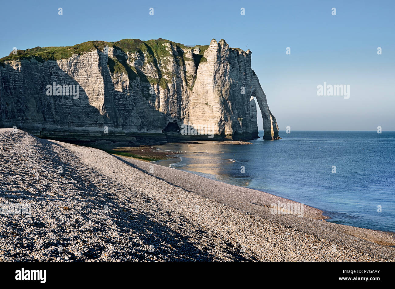 Famous pebble beach and cliff Aval of Etretat, commune in the Seine ...