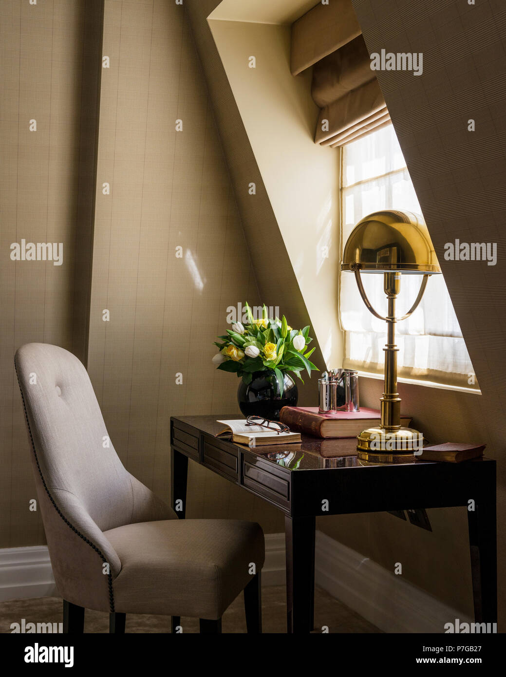 Desk and chair under window Stock Photo Alamy