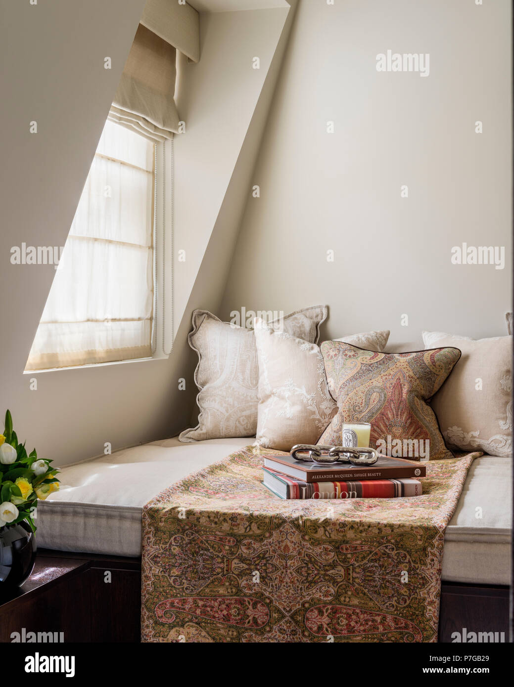 Daybed under window Stock Photo