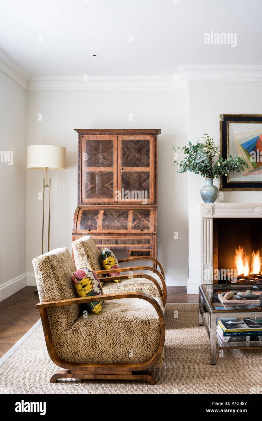 Modern armchairs in living room Stock Photo - Alamy