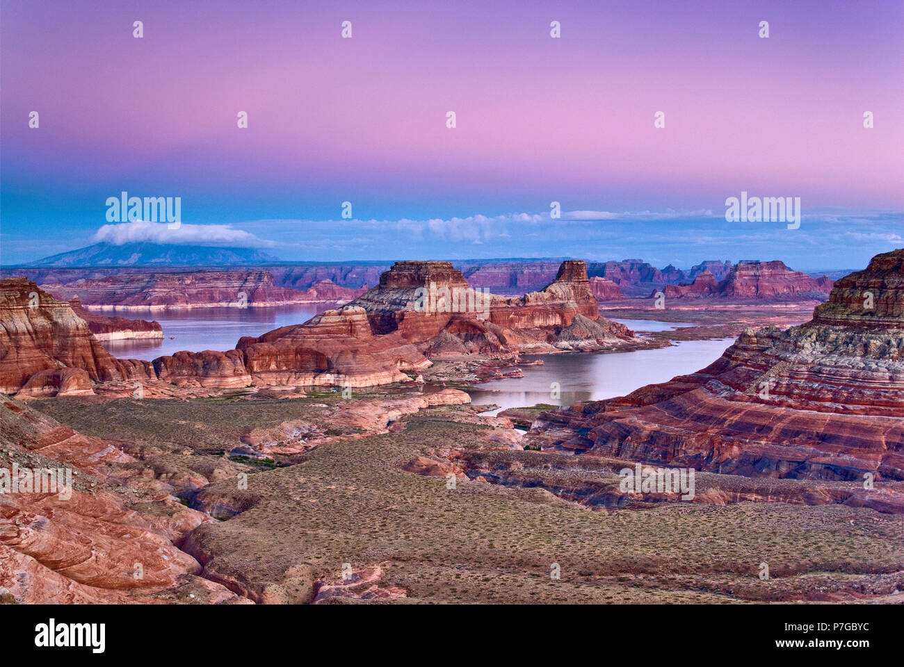Gunsight Butte at Lake Powell, Navajo Mountain in distance, sunset