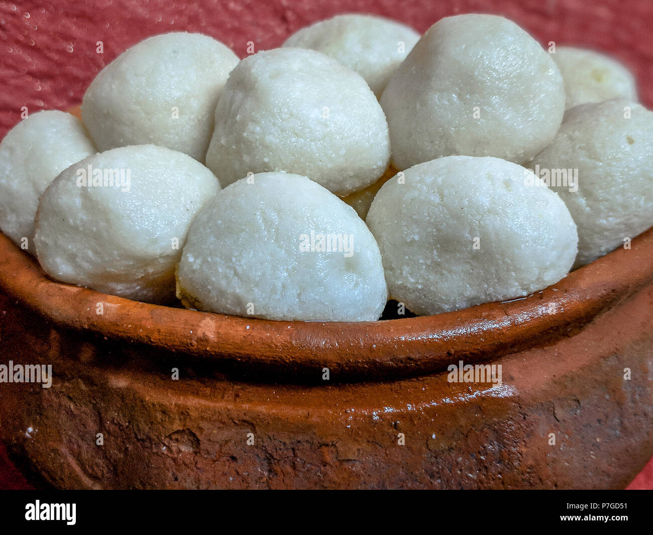 Indian Sweet Rasgulla Also Know as Rosogolla, Roshogolla, Rasagola, Ras Gulla is a Syrupy Dessert Popular in India. Selective focuse is used. Stock Photo