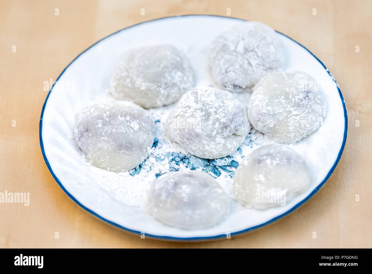 Many round whole pieces of mochi sticky glutinous rice cake dessert