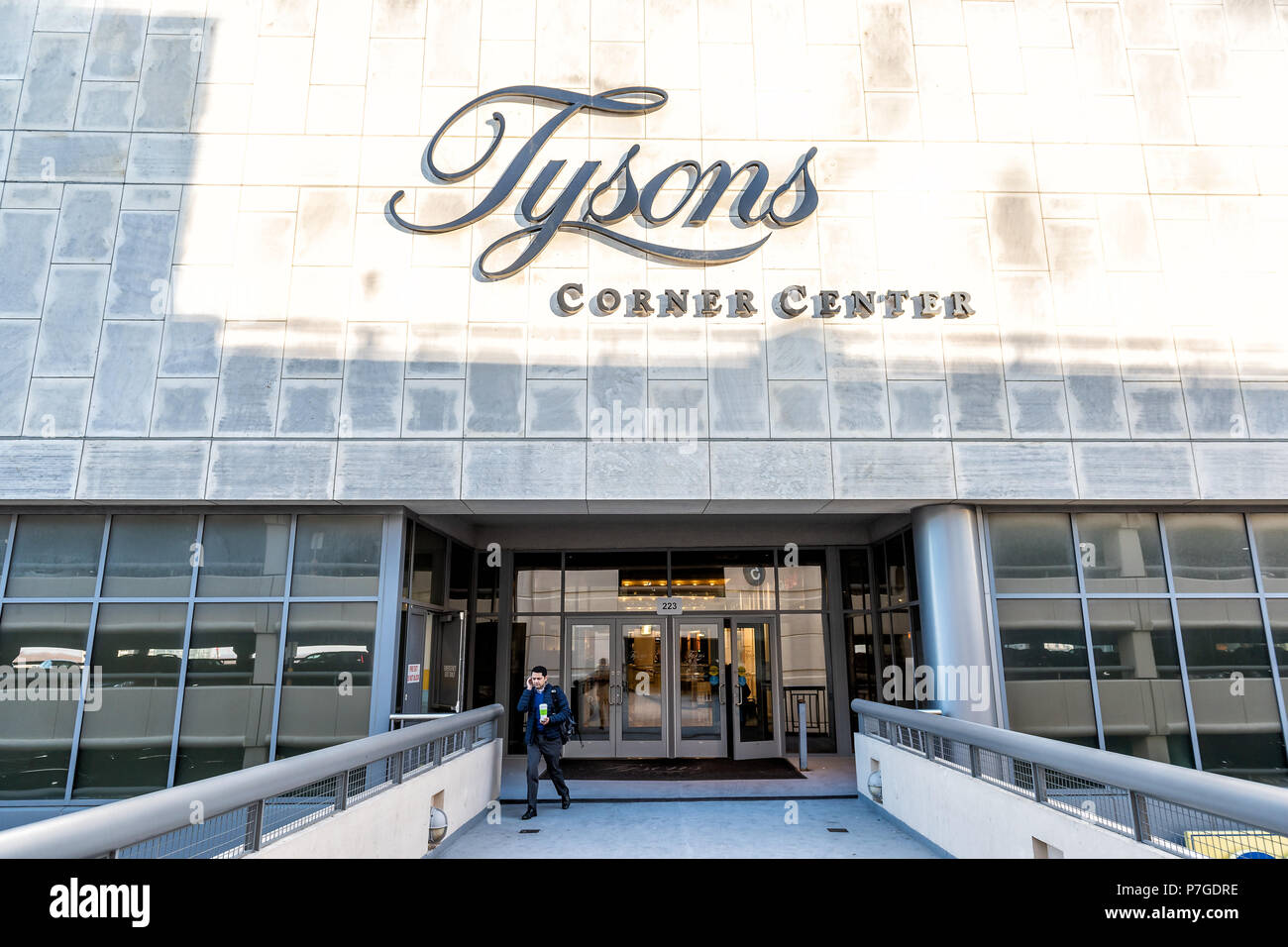 Tysons, USA - January 26, 2018: Sign, entrance doors on bridge to