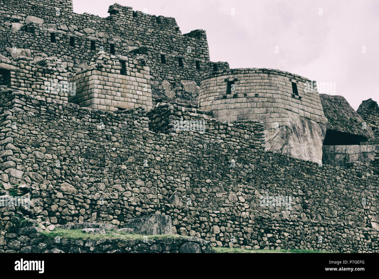 Stone magical ancient ruins along the paved path Inca Trail to Machu ...