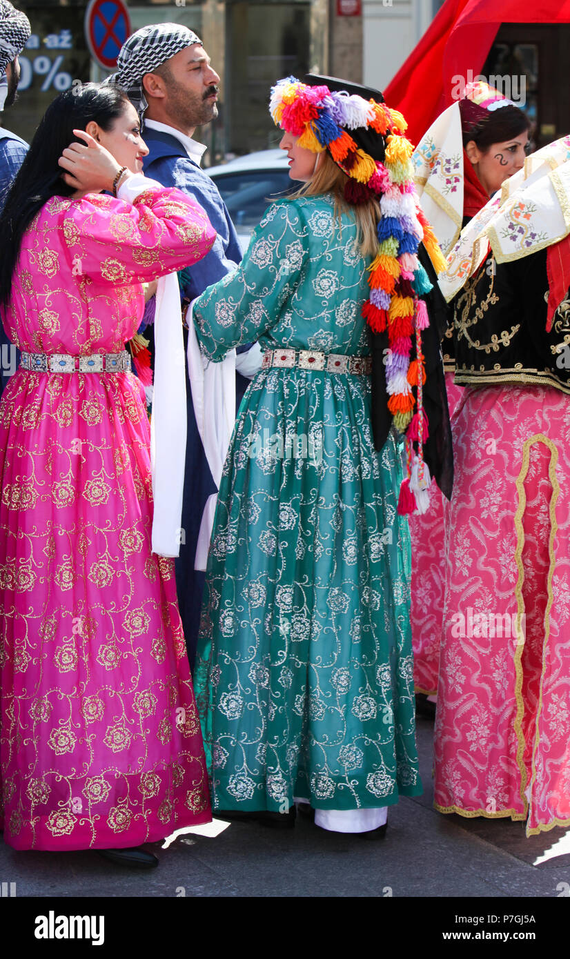 Celebrating in Cultural Dress Stock Photo
