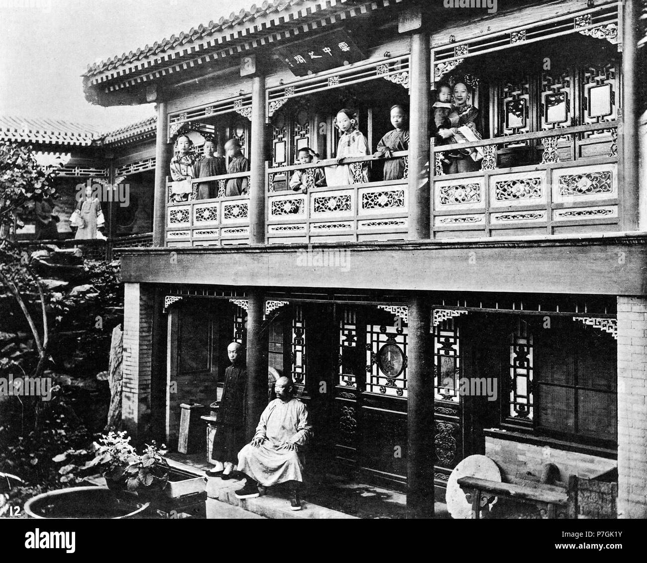 English: John Thomson: NO exhaustive or thoroughly satisfactory description of the domestic architecture of the Chinese house has, so far as I am aware, ever yet been given. A principal reason for this omission is the lack of anything like complete acquaintance with the subject. The fact is, the country is in itself a vast one, and its domestic architecture, though remarkably similar throughout, yet presents wide divergences of construction, designed to meet the varying requirements of climate and position. A second difficulty arises from the strong dislike entertained by the people against ad Stock Photo