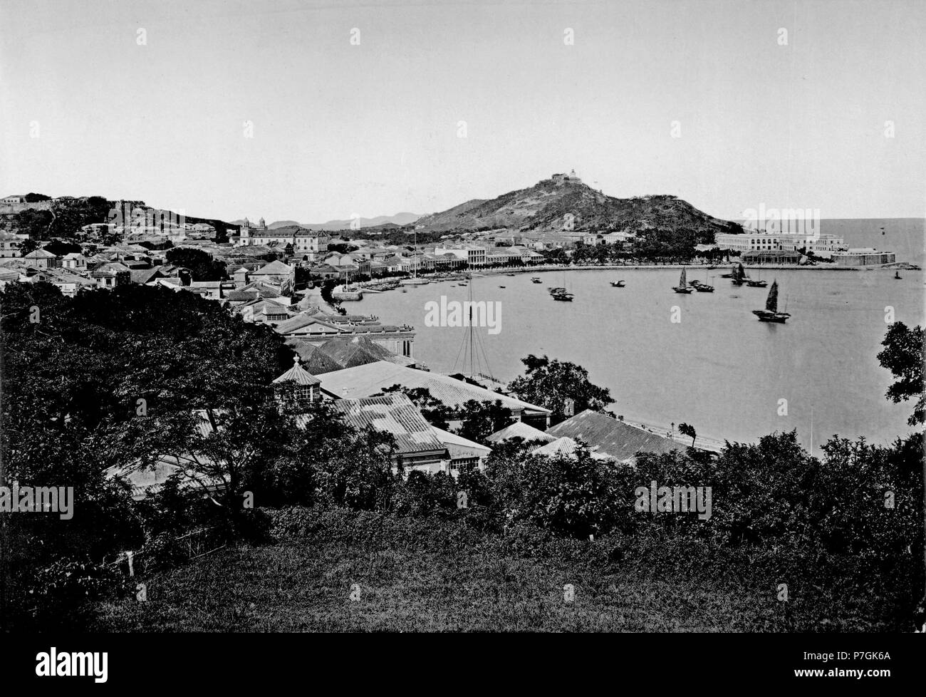 English: John Thomson: MACAO, in ancient times a small island off the mainland of Hiang-shan in the Kwang-tung Province, has since been united to the coast by a sand-bar. This occurrence so disgusted the Chinese, that in I5 7 3l shortly after the troubles which the settlement of a few Portuguese at Macao involved, they built a barrier across the bar, with a view to exclude the foreigners from intruding into the interior of the country. The Chinese account of the early Macao Portuguese, and of the manner in which the colony was established, differs materially from that supplied by the Portugues Stock Photo