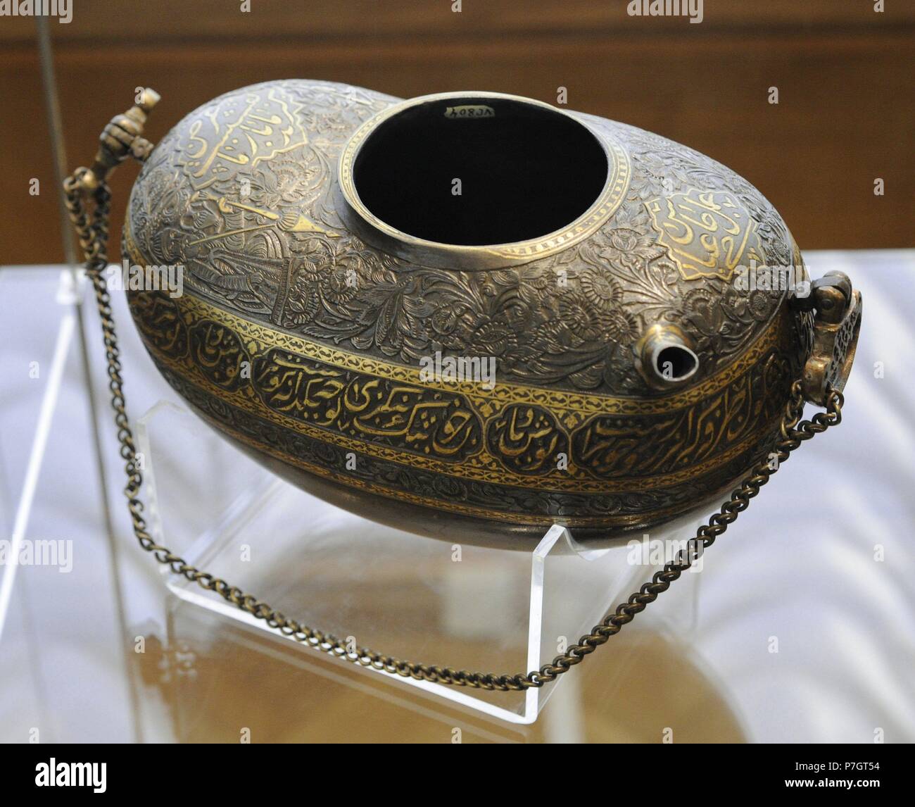 Islam. Near East. Persia. Kashkul (begging bowl for a Dervish). Steel; casting, carving, gilding. Iran, Late 19th- early 20th century. By Hajji 'Abbas (?). The State Hermitage Museum. Saint Petersburg. Russia. Stock Photo
