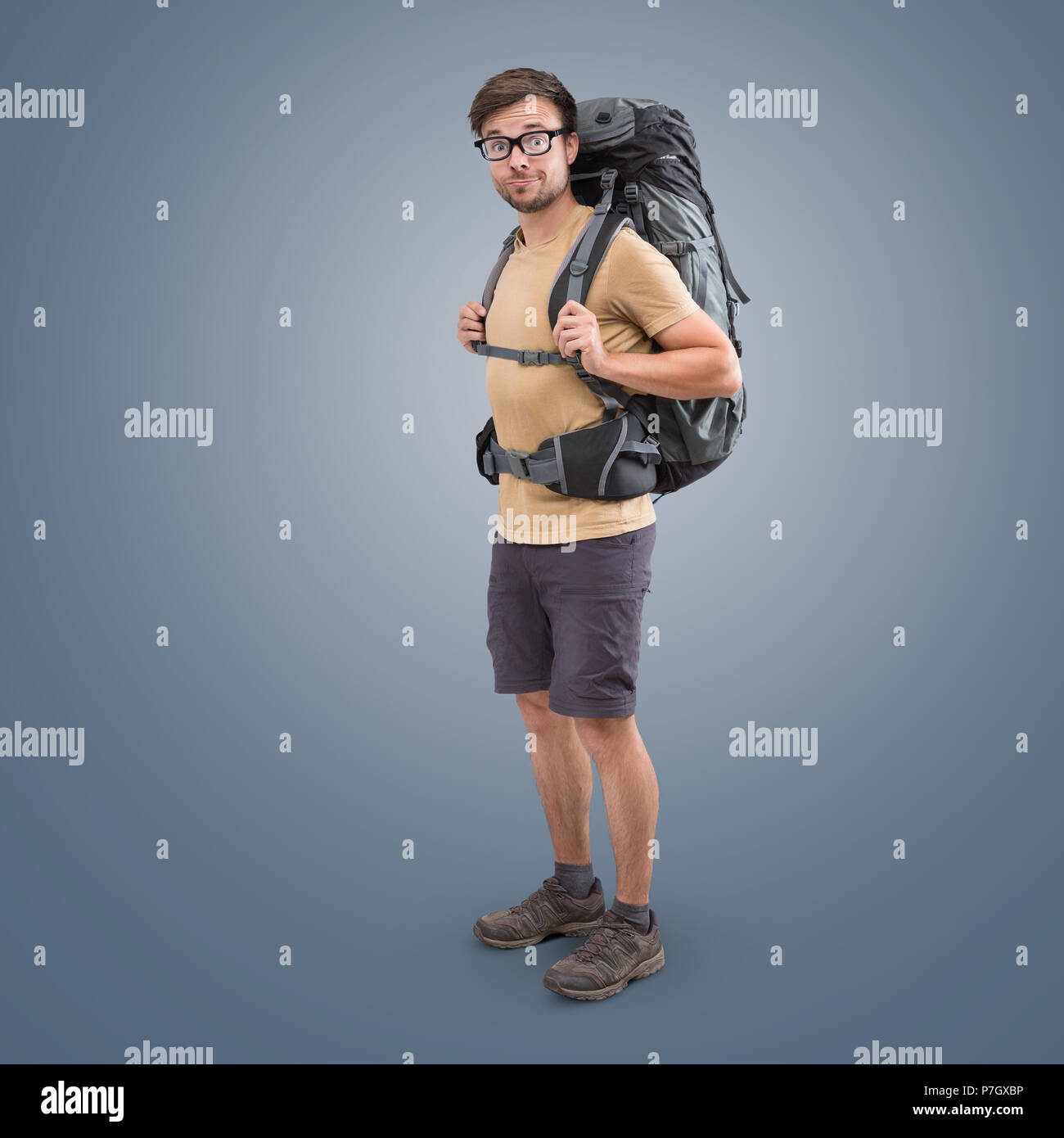 Hiker with a large backpack and short clothing Stock Photo
