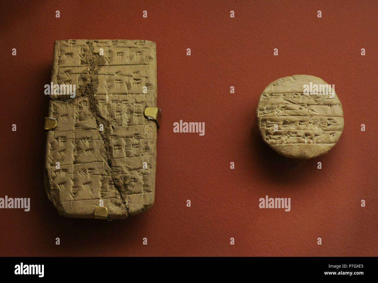 Sumer. Mesopotamia. Right: School tablet. Sumerian words. The exercise was probably corrected by a teacher. Left: School mathematical tablet. The state Hermitage Museum. Saint Petersburg. Russia. Stock Photo