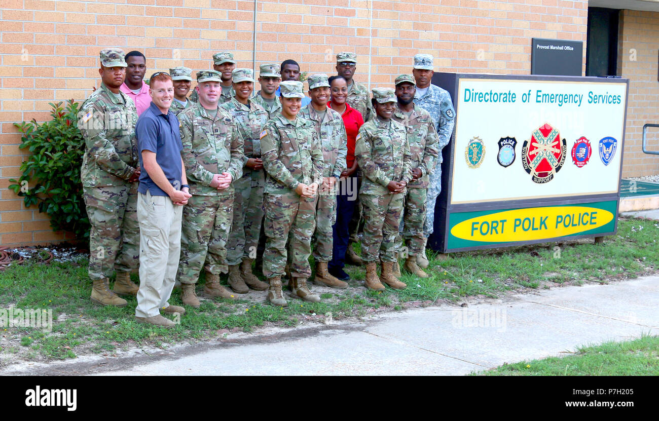 Members of the Virgin Islands National Guard 661st Military Police Law and Order Detachment, were certified by Staff Sgt. Patrick Sanders (front row, first from left), Ft. Polk 91st Military Police Detachment, for completing a Mechanical Control Holds (MACH) and oleoresin capsicum (OC) spray and X26 series taser course as part of annual training at Ft. Polk, LA, June 26, 2018. This training reiterated and put to use the members of the 661st Military Police Law and Order Detachment military occupational specialty.  (U.S. Army National Guard photo by Army Sgt. Priscilla Desormeaux/Released) (Pho Stock Photo