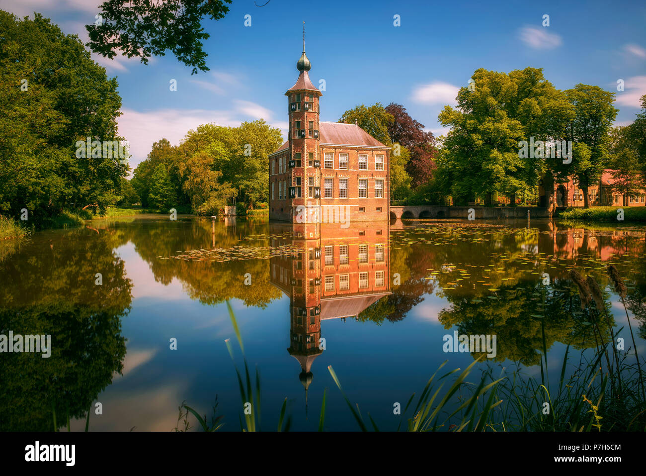 Castle Bouvigne and the surrounding park with reflection in water situated near the Dutch city of Breda in Netherlands. Long exposure. Stock Photo