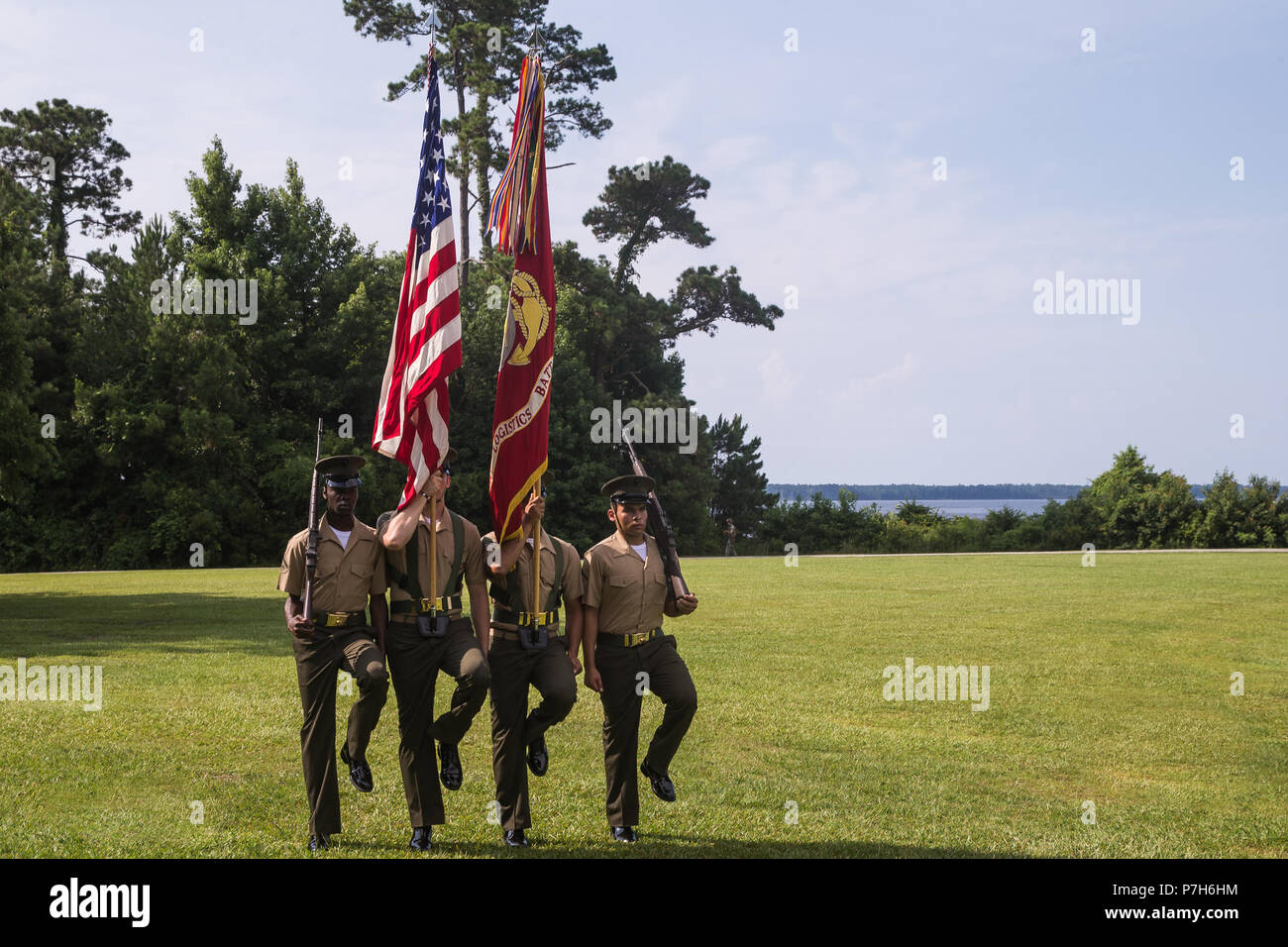 The Combat Logistics Battalion 6, Combat Logistics Regiment 2, 2nd Marine Logistics Group, color guard march in a change of command ceremony on Camp Lejeune, N.C., June 26, 2018.  During the ceremony, Lt. Col. Karin Fitzgerald relinquished command of CLB 6 to Lt. Col. Daniel Rosenberg. (U.S. Marine Corps photo by Lance Cpl. Scott Jenkins) Stock Photo