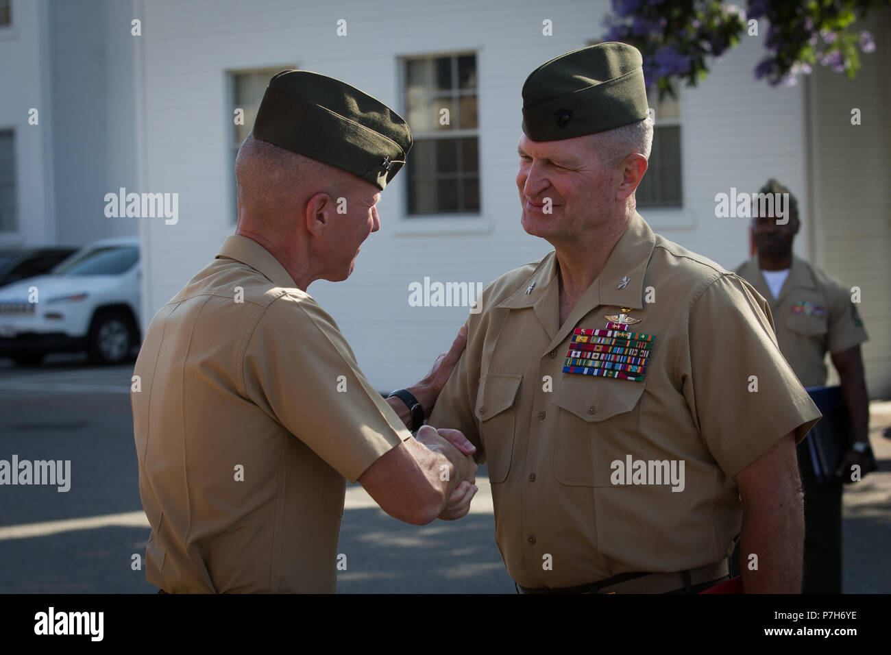 U.S. Marine Corps Maj. Gen. Eric M. Smith, left, the commanding general ...