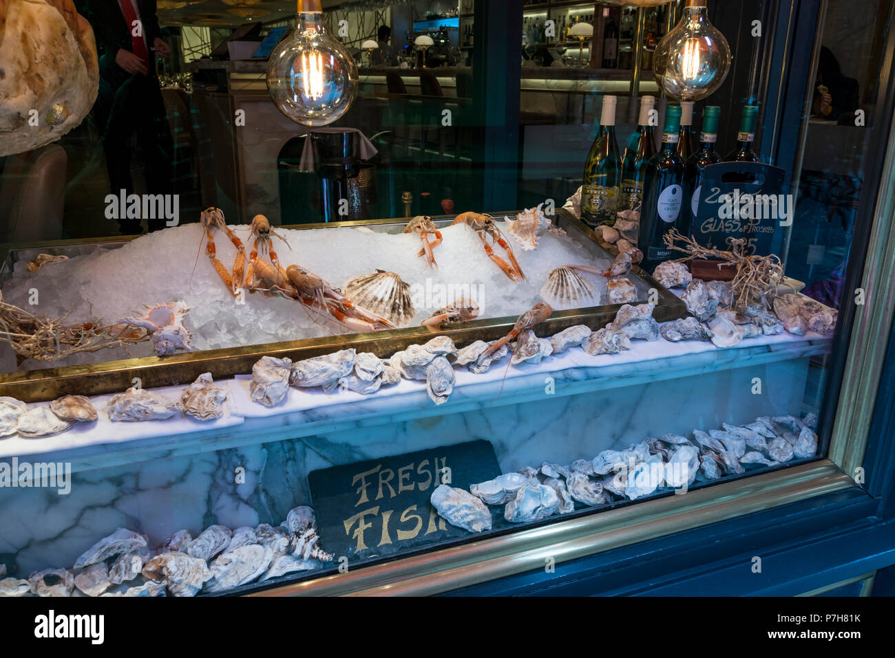 Window display of various seeafood at Fumo Italian Restaurant, Covent Garden, London, UK Stock Photo