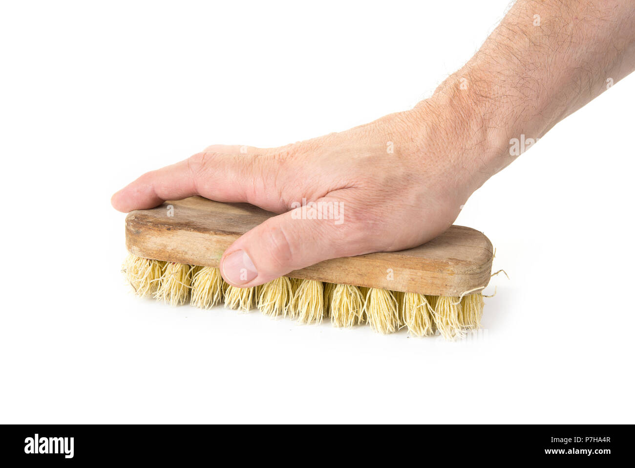 Old Wooden Floor Brush For Cleaning The Dirt On The White Stock