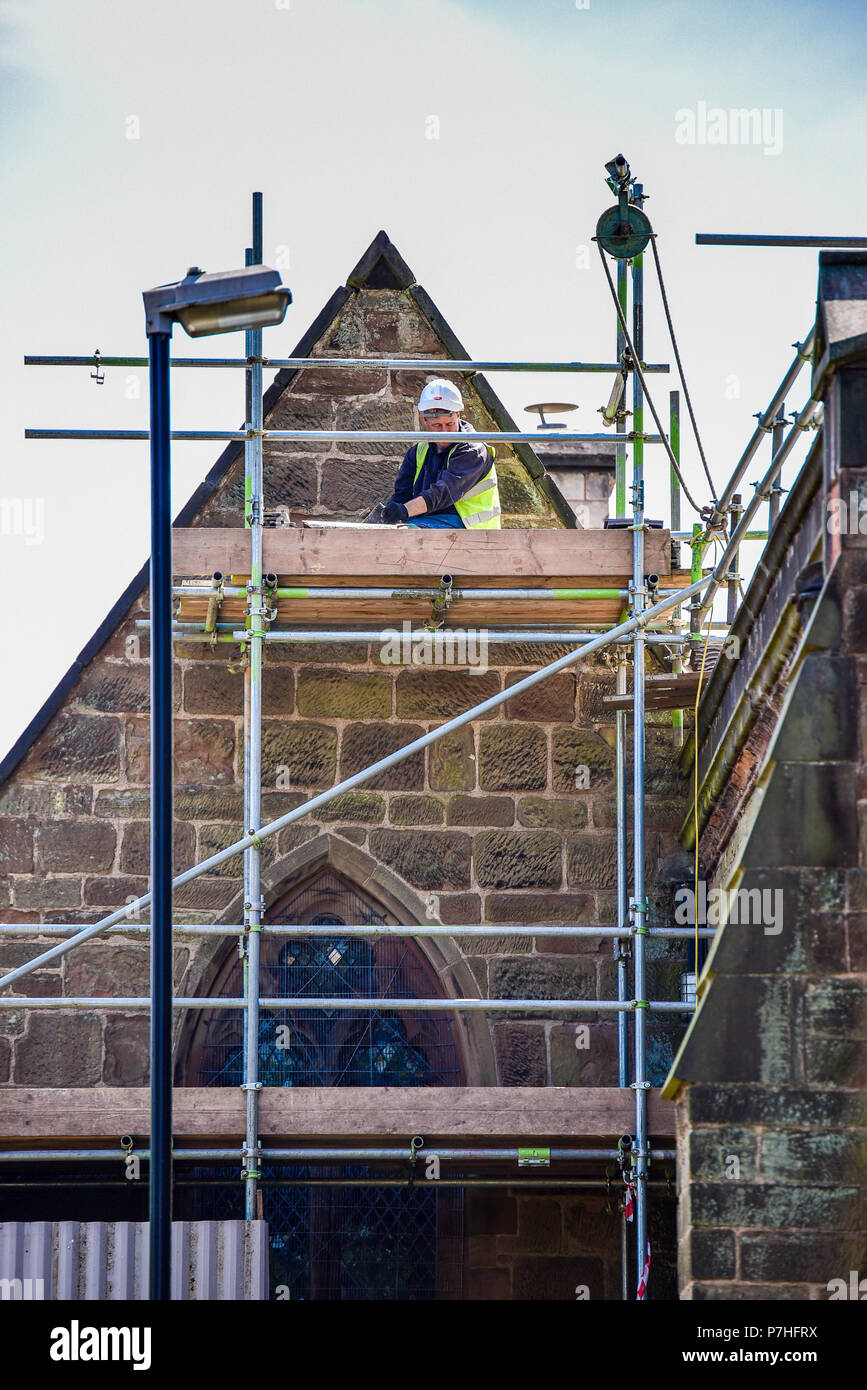 A worker on scaffold Stock Photo