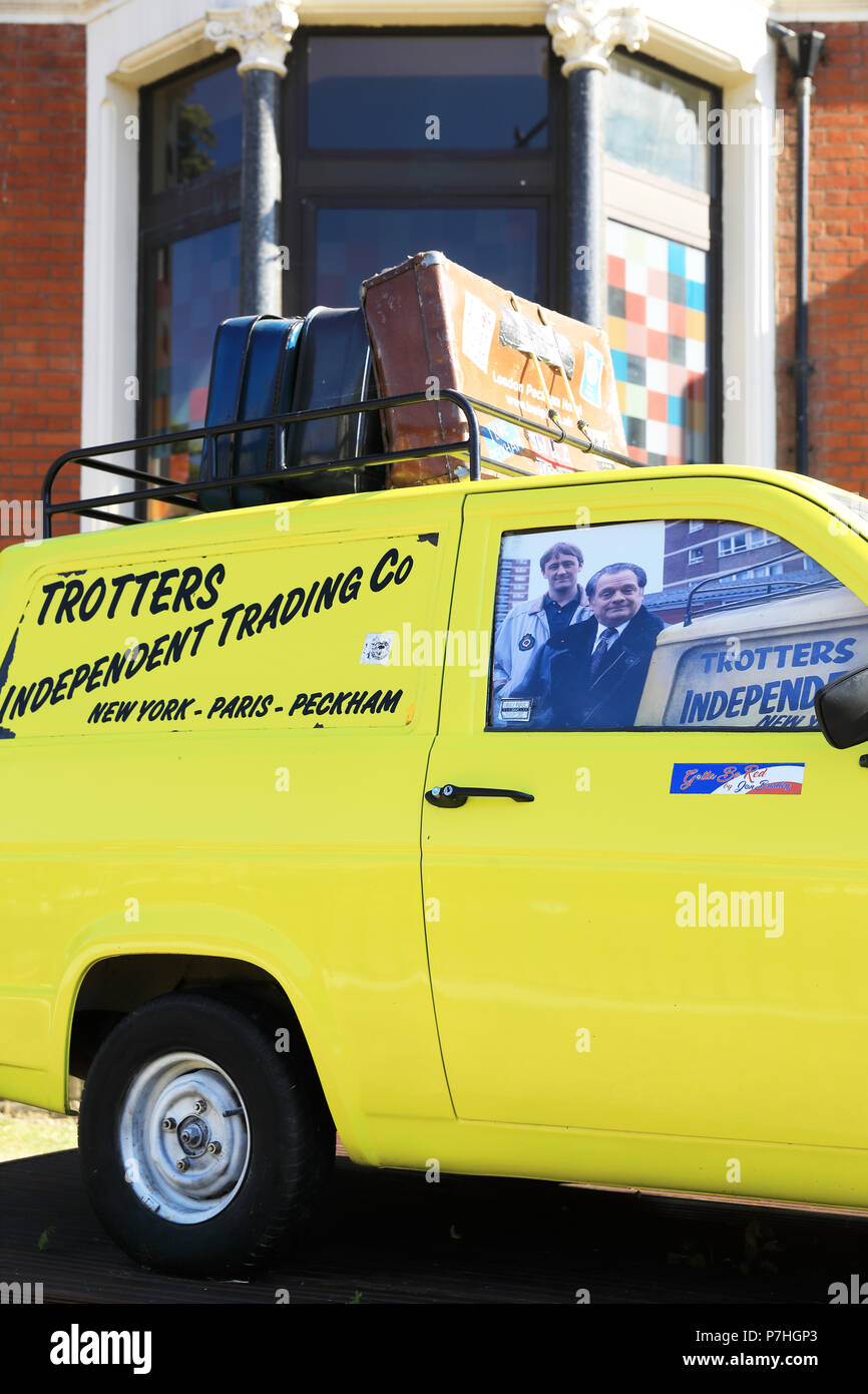 A replica Reliant Robin from the days of the Del Boys's Trotters in the TV series 'Only Fools and Horses', in Peckham, south London, UK Stock Photo