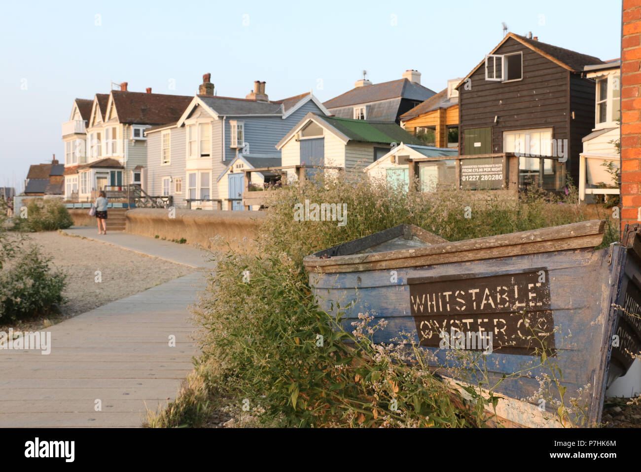 Quaint Fisherman S Cottages Next To The Seafront Walkway At