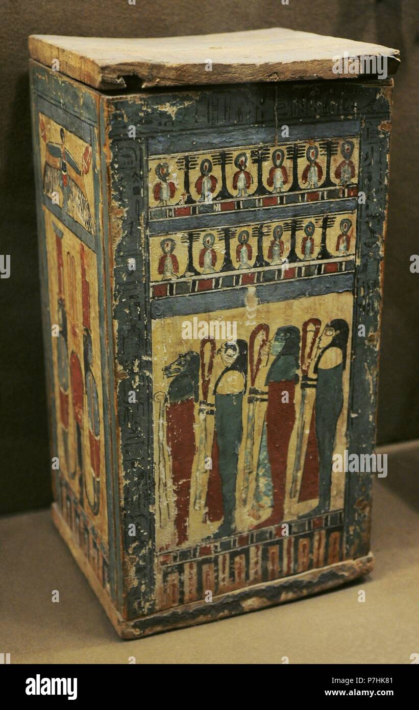 Box containing shawabti. The wooden box is decorated with paintings of different deities. Tomb of Ahmose priest. The State Hermitage Museum. St. Petersburg. Russia. Stock Photo