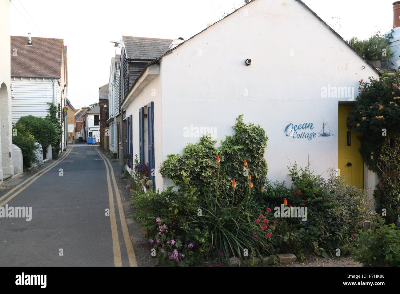 Quaint Cottages On Sea Wall Whitstable Kent England Stock Photo