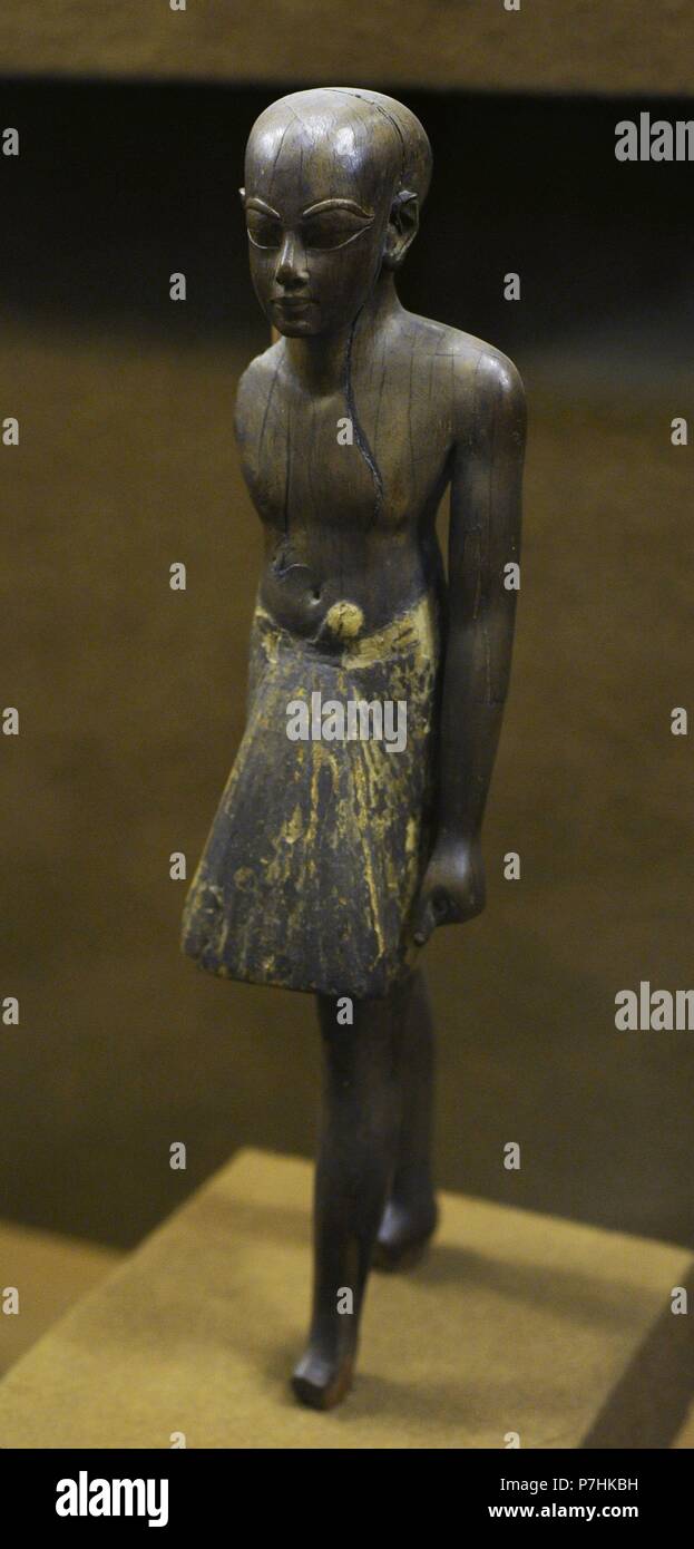 Ancient Egypt. Wooden statuette of a Pagan. 14th century BC. New Kingdom. 18th Dynasty. The State Hermitage Museum. Saint Petersburg. Russia. Stock Photo