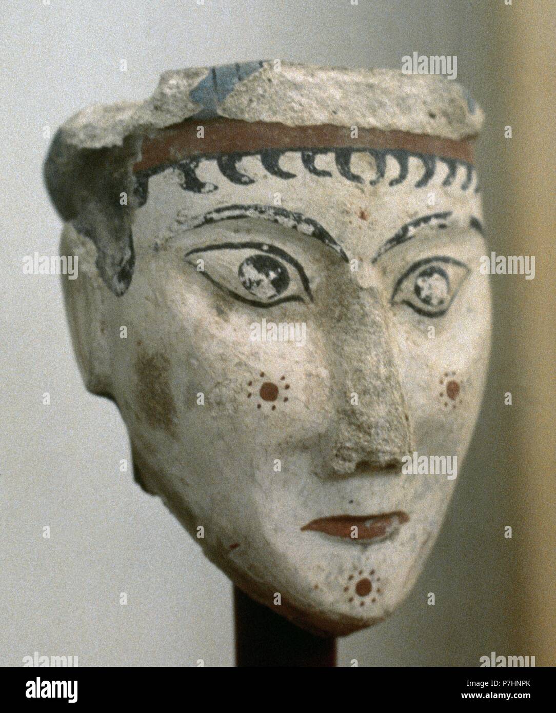 Plaster head of a woman (possibly a goddes or sphinx). Acropolis at Mycenae, 13th century BC. Greece. National Archaeological Museum. Athens, Greece. Stock Photo