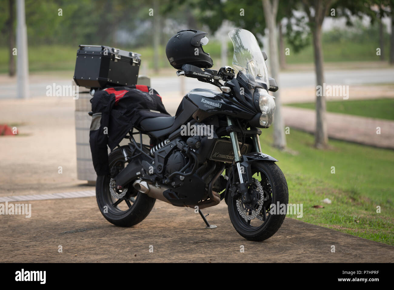 Kawasaki Versys 650 touring motorcycle parked on the side of the road Stock Photo - Alamy