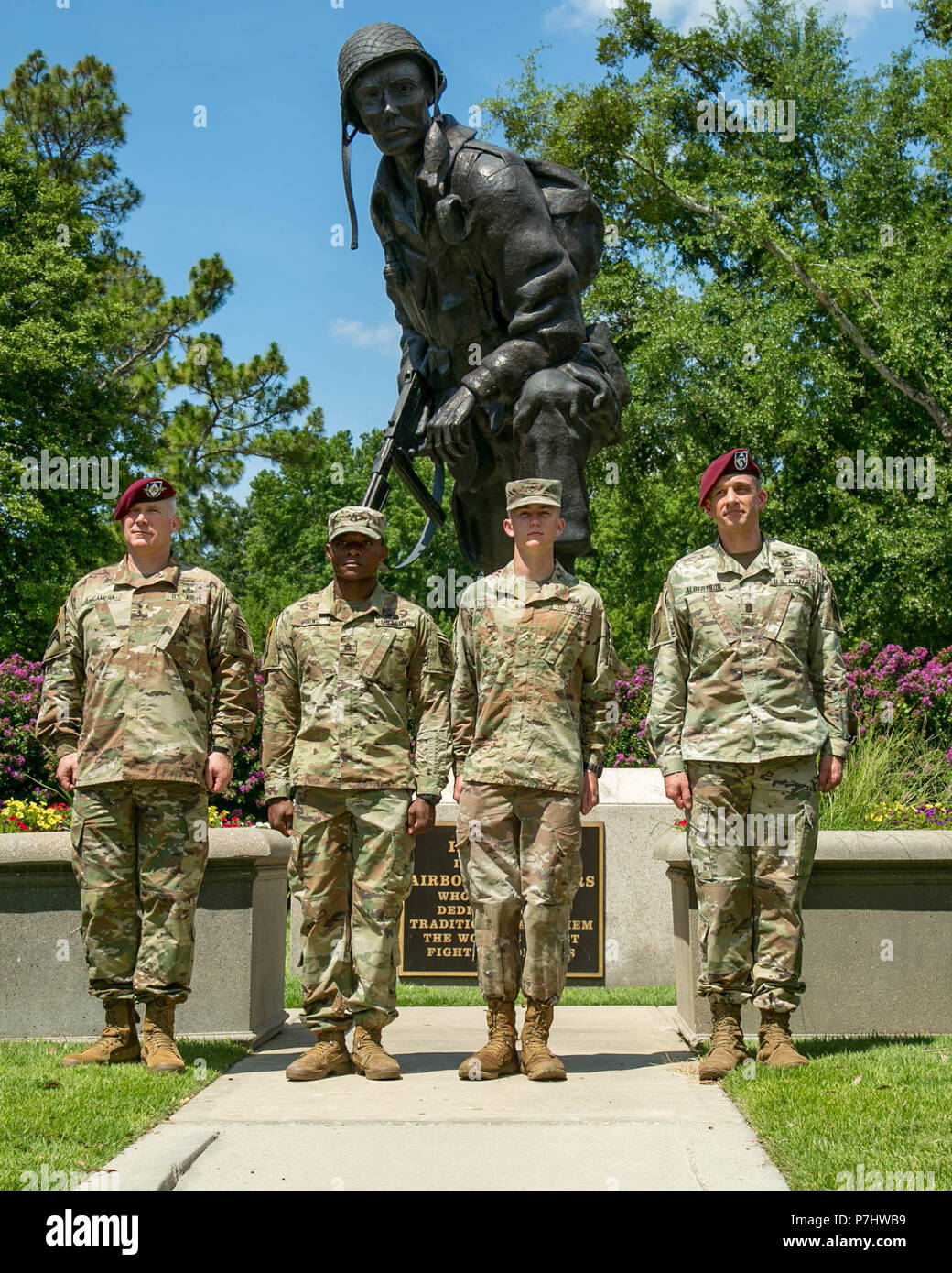 From left to right Lt. Gen. Paul J. LaCamera, Staff Sgt. Ifegwu Ifegwu,  Pfc. Cadem J. Emmons, Command Sgt. Maj. Charles W. Albertson pose for a  photo after Best Warrior Competition awards