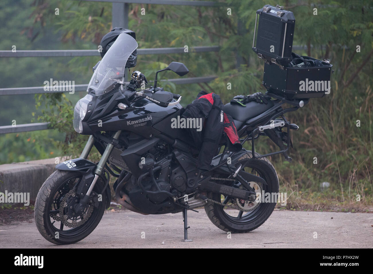 Kawasaki Versys 650 touring motorcycle parked up on the side of the road  Stock Photo - Alamy