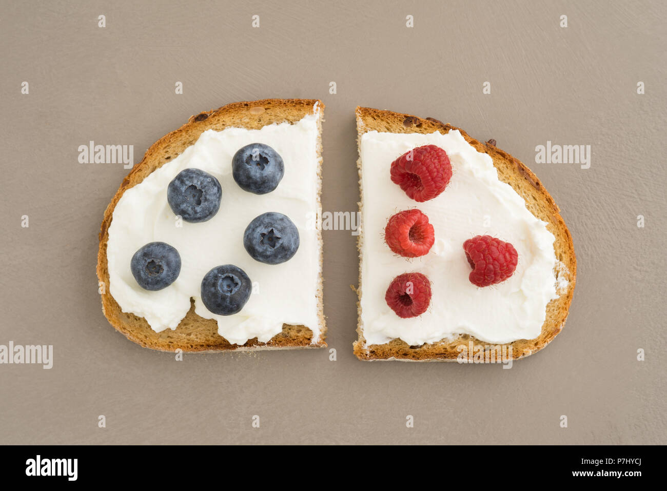 Sandwich cut in half with cream cheese and fresh fruit Stock Photo Alamy