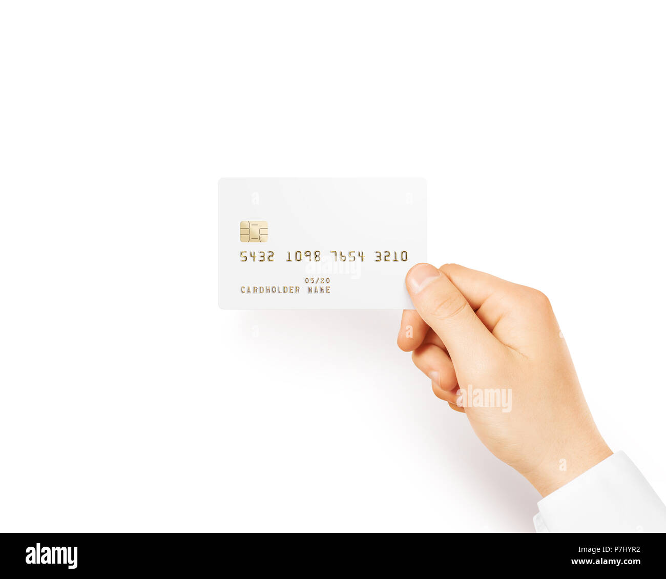 Hand holding blank white credit card mockup isolated. Empty plastic card mock up hold in arm. Clear surface bank card with electronic chip. Debit card concept design presentation template. Stock Photo