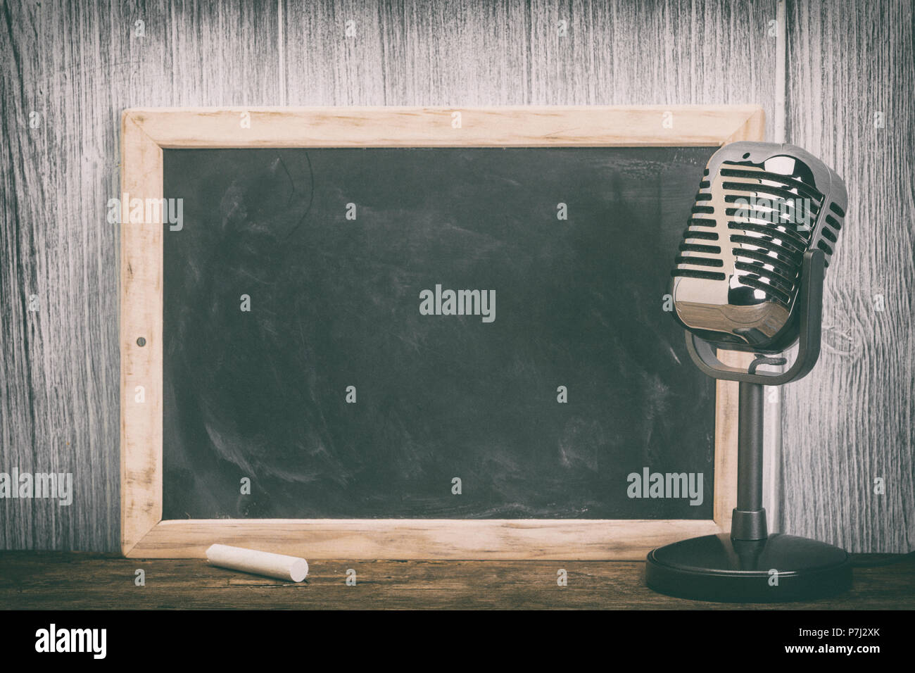 Blank chalkboard and retro microphone, vintage processing Stock Photo