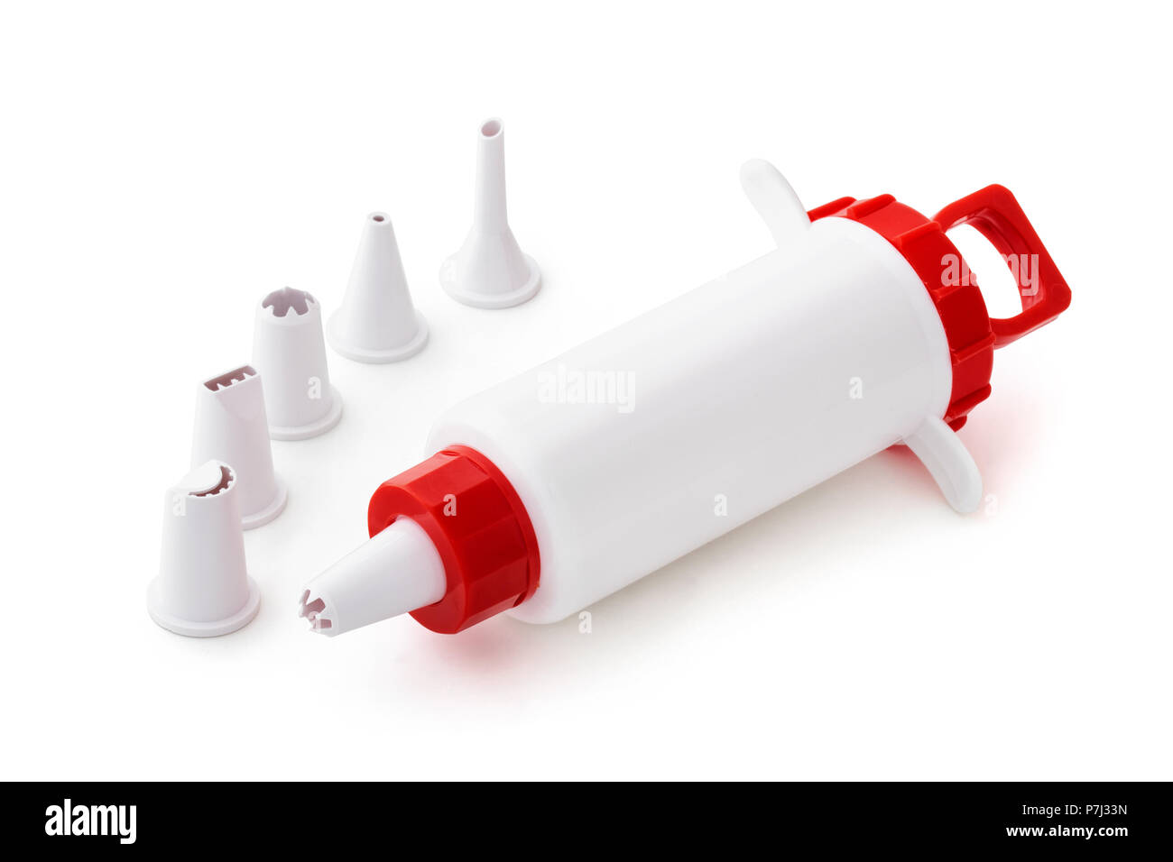 Closeup shot of culinary syringe isolated on white background Stock