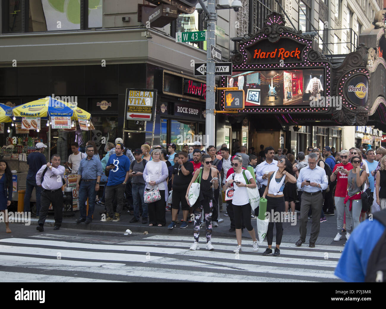 Tourists on 7th Avenue in Times Square on the first official day of