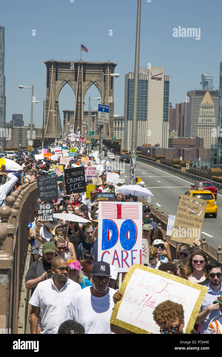 In a national day of protest against the cruel and unjust treatment of families at the Mexican US border thousands of New Yorkers rallied and marched over the Brooklyn Bridge speaking out against the fascist like immigration policies of the Trump Administration. Stock Photo