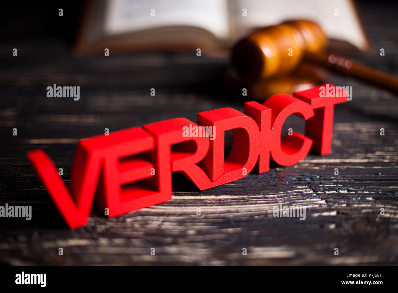 Law theme, mallet of the judge, justice scale, wooden desk background