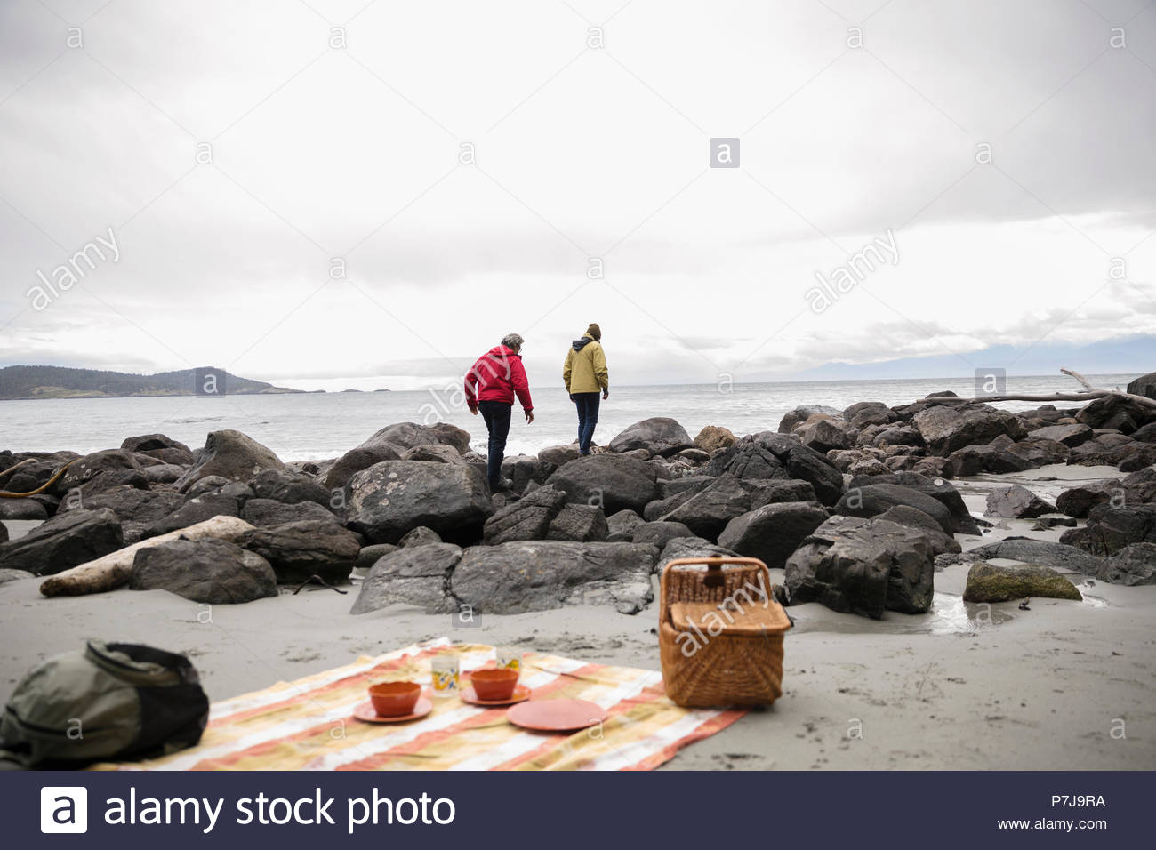 Senior couple enjoying at beach hi-res stock photography and images - Alamy
