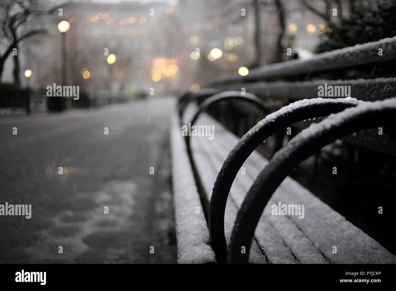 Snowy bench, Union Square Park, Manhattan, New York, United States Stock Photo